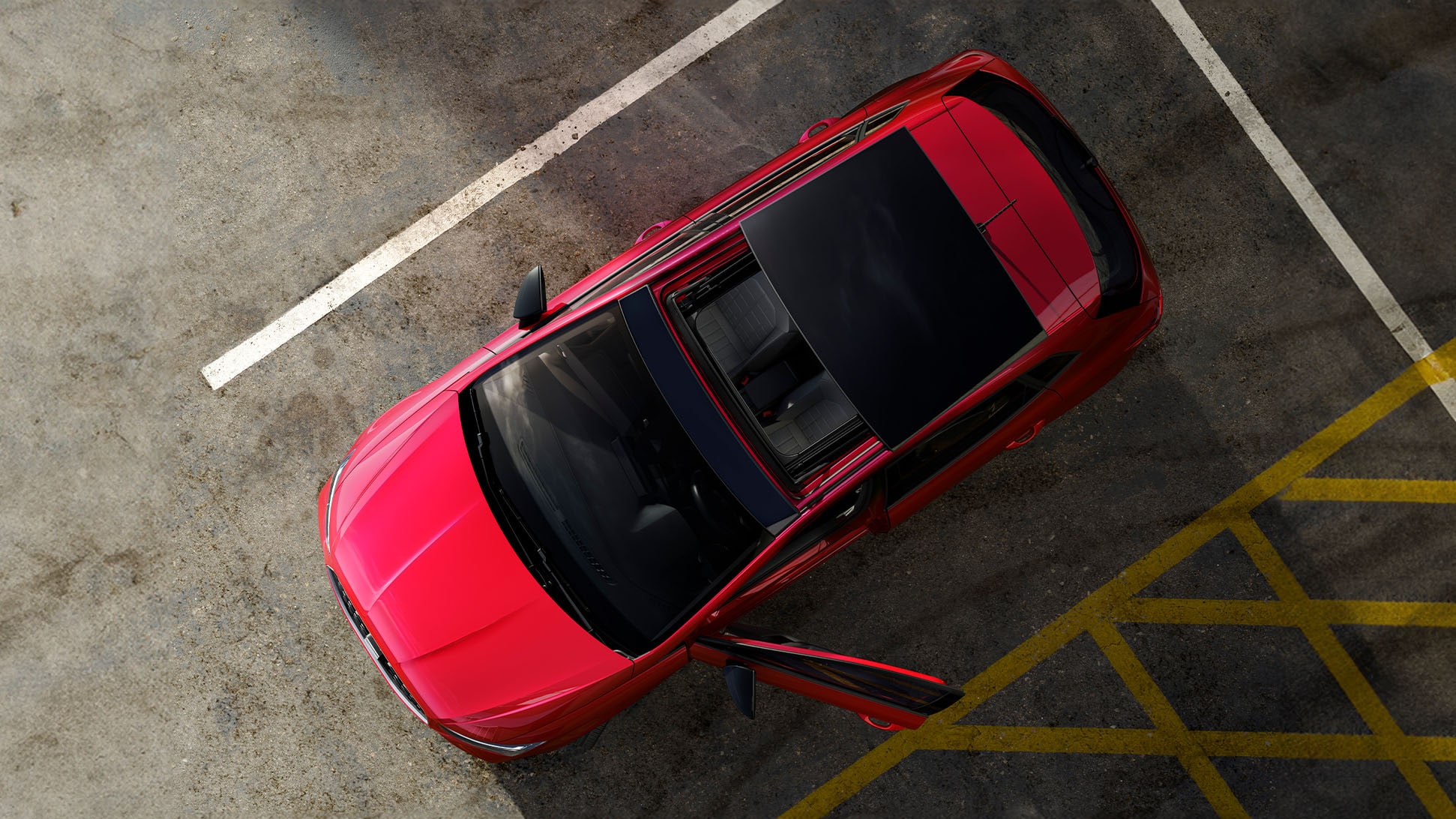 Roter SEAT Ibiza von oben in einem Parkhaus, mit offenem Fahrertür. Sicht auf das Dach mit Panoramadach und Ledersitzen im Inneren. Parkplatzmarkierungen auf dem Boden erkennbar Roter SEAT Ibiza von oben in einem Parkhaus, mit offenem Fahrertür. Sicht auf das Dach mit Panoramadach und Ledersitzen im Inneren. Parkplatzmarkierungen auf dem Boden erkennbar