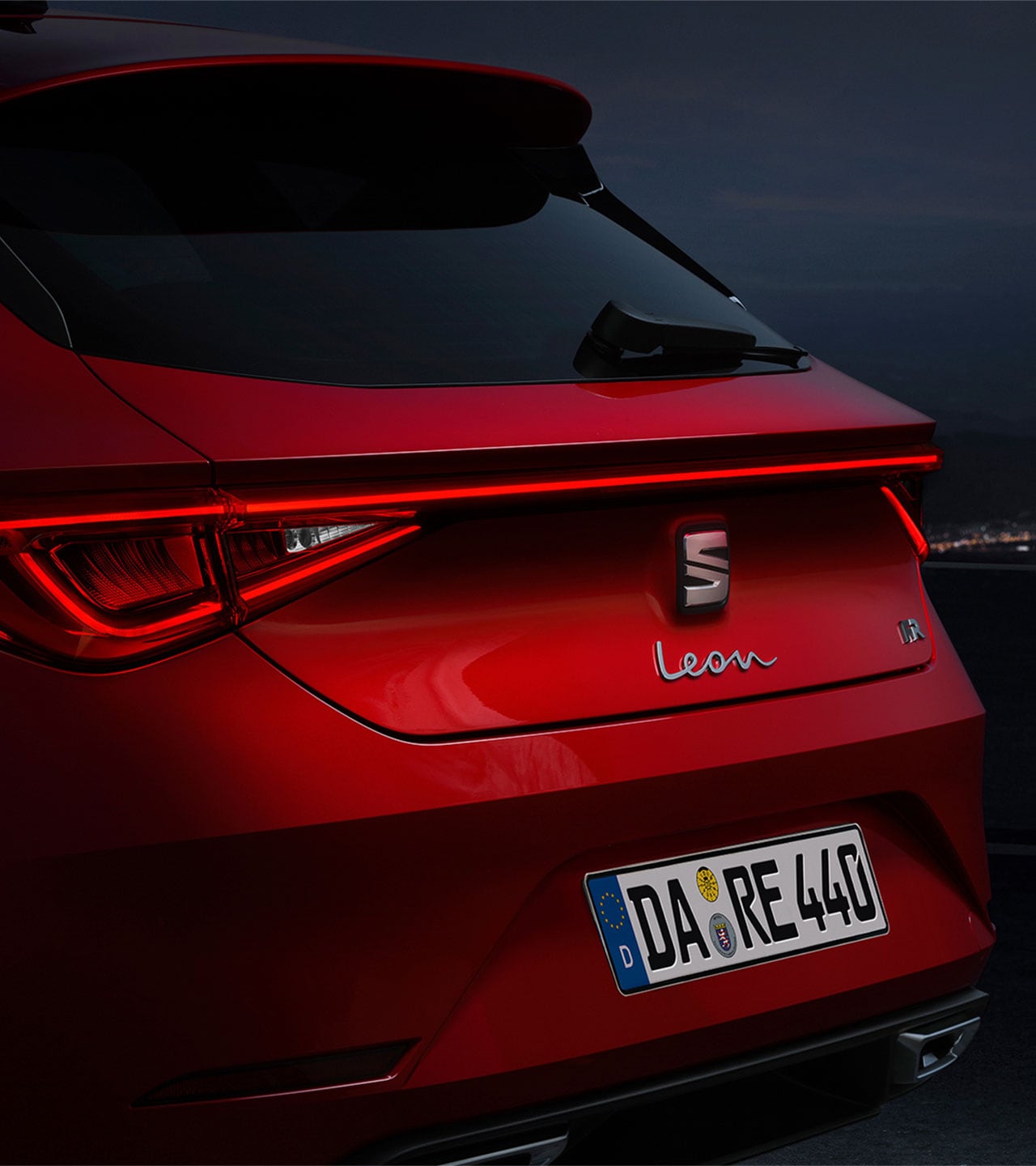 Hybrid car seat leon sportstourer in blue on the road, driver opening car door in the city, shadows